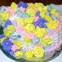 Wilton Course 2 Final Cake This is a white cake with raspberry filling iced in buttercream with royal icing flowers. I'm so pleased with the final product. I...