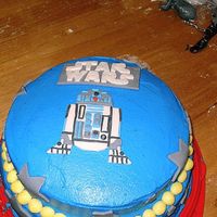 Star Wars Cake I made this cake for my boyfriends birthday. This was the first time I'd ever done something like this. It's a 2 tier, 4 layer...