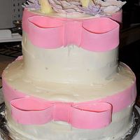 Springtime Birthday Cake I baked a spice cake with cream cheese frosting. The layers are 9 and 6. With gumpaste accents. I love the flowers on top of the cake. It...