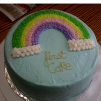 Wilton Cake Course 1 I had a lot of fun with this cake. i was very pleased with the rainbow. My hand writing ruined it's presentation.