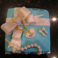 Tiffany Box Cake Made this for a friends mom. She loves to shop. Its an almond cake with almond butter cream and almond flavored MM fondant. I really...
