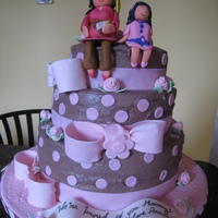 Pregnant Mommy Cake I made this for a friend who had a combined graduation/baby shower...hence the pregnant lady with a graduate hat. The girl next to her is...