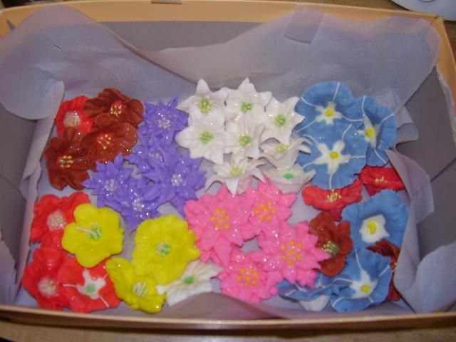 Mix Flowers This flowers are watermelon flavor royal icing. I was practicing. They taste and smell good, yummy!