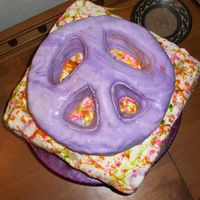 Tyedye Peace Sign Cake this was a cake that i made for my sister in law for her birthday. it is MMF and vanilla BC