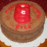Cincinnati Reds Cap Cake cap and letter made from fondant and rice cricpy treats they wanted chocolate buttercream