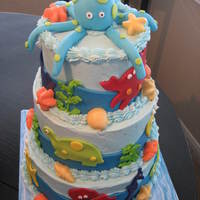 Under The Sea Baby Shower Cake Bottom tier is Triple Chocolate with Fudge Filling, Middle tier is French Vanilla with Vanilla Buttercream Filling. Top tier is Red Velvet...