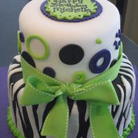 Michelle's 40Th Birthday Cake Bottom tier is Carrot Cake with Cream Cheese Filling. Top tier is Pina Colada Cake with Pineapple Buttercream Filling. She loves Wicked and...