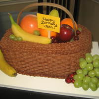 Fruit Basket Cake Cake made for a 95th Birthday. The gentleman owned a fruit farm. :) Triple Chocolate Cake with chocolate mousse filling and chocolate...