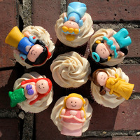 Disney Princess Cupcakes I made disney princess cupcakes out of fondant.