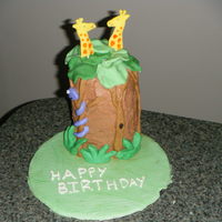 Jungle Themed Cake I made this cake for my cousin's birthday who had just come back from Africa.