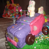 Easter Pickup Truck...or Eastermobile yup,..The ground(bottom cake) is a chocolate cake with BC frosting and colored Coconut.The car(cake on the top) is a vanilla cake with...
