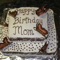 Chocolate Butterfly Cake This is one of my first cakes. I made it for my mother-in-law's birthday. It was a chocolate WASC cake with cannoli filling and...