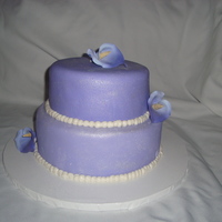 Purple Passion I did this for a co workers anniversary. Its chocolate, vanilla and strawberry cake with butter cream and mm fondant Accented with sugar...