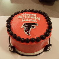 Atlanta Falcons Cake This is a cake I did for my boyfriend. He LOVES the atlanta falcons... I wanted to make him a big falcon but he hates the taste of black...