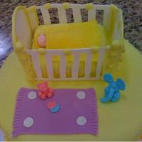Baby & Crib Birthday Cake for a soon-to-be-mom. Chocolate cake with vanilla custard filling. Everything handmade from fondant. Thanks for the crib...
