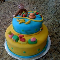 Curious George Chocolate cake with chocolate ganache. Chocolate filling. Everything made from fondant...even George!!