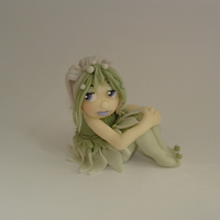 Fairy Girl This little fairy is hand sculpted using fondant.