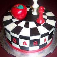 Gabi's Birthday Cake Individually cut squares of fondant over buttercream. Decorations made of fondant.