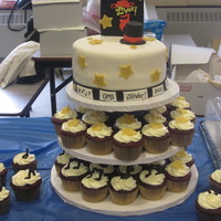 Oliver Cast Party 8" Choc cake on top, red velvet cupcakes with cream cheese frosting