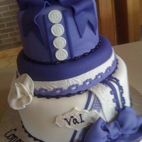 Valerie This cake was so fun to make!! I had full creative license as the client just wanted something purple and pretty. She likes to scrapbook,...