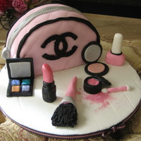 Glamour Sweet 16 Chocolate cake, buttercream crumb coat, accessories made out of mmf and luster dust.