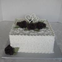 Roses & Hearts Eggplant colored roses for a bridal shower to match the bride's dress.