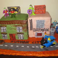 Gotham City Cake My grandson was having a Batman themed party for his fifth birthday and wanted a Gotham City cake. Needless to say, he was thrilled with...