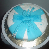 From The Fondant To The Bow... This was a yellow butter cake with peach filling that I made in Course 3 as a gift for a friend who recently had a baby boy. It was my 1st...