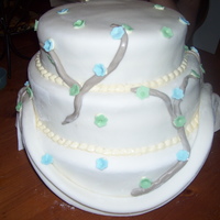 Donna's Wedding Cake This is only my 3rd time using fondant. My first time doing gumpaste flower. And, my first time doing draping. Oh, and my first wedding...