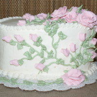 Rose Garden Pound Cake w/ guava filling. Buttercream icing and flowers. I know I can see some crums. I only had a few hours to do this cake and that...