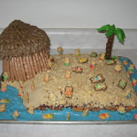 Teddy Bear Beach Day Birthday cake for my nephew's 1st birthday. The beach is coconut cake with macaroon topping and then cake crumbs and brown sugar for...