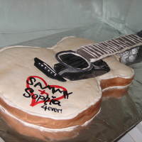 Guitar Cake The emblem at the bottom says "sammy + sophia forever", since it is for my friend sam and his guitar is named sophia.