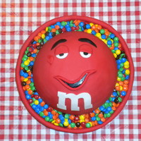 Red M&m Birthday Cake I made this for a friend's father for his birthday. He is an M&M fanatic. The cake matches a personalized candy dish. I did WASC...