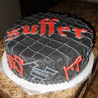 Suffer Cake I made this cake based on a new clothing line created by a UFC fighter. The cake is iced with chocolate buttercream and the lettering is...