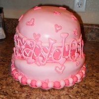 Pink Pirate Cake Vanilla and chocolate with buttercream and covered with vanilla fondant. Letters created with colorflow icing.