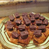 Mini Graduation Caps The cakes are miniature banana fosters cakes. The graduation caps were made from banana slices dipped in chocolate and topped with a...