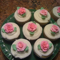 Cupcakes W Roses! These were a gift for mom for mothers day! The roses were made from fondant and gumpaste.