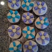 Birthday Cupcakes! These were birthday cupcakes for a friend. The bows are made of fondant and gum paste.