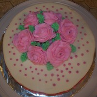 Roses Wilton Course 1- Final CakeSome of the roses were made with Hersheys Kisses as a base