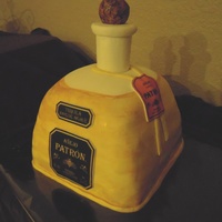 Patron Tequila Bottle Cake Patron Anejo Tequila Cake, neck and "cork" are rice krispy treat covered with fondant. Labels are printed with edible ink. Carved...