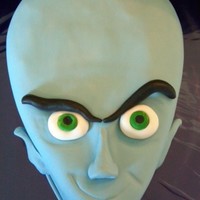 Megamind Cake This is Megamind's head, the movie just opened yesterday and this is for a young boy's birthday party. The cake itself is vanilla...