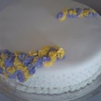 Wild Pansies I made this cake for the Deacons and their wives at a church where my tennis coach preaches. Chocolate cake with buttercream and covered...