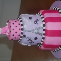 Poodles In Paris Themed Baby Shower Vanilla cake, BC filling, fondant. Flowers, tower, dots are modeling chocolate. Poodle is fondant.