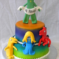 Gumby & Friends Gumby & friends are all sculpted from fondant, airbrushed the colors on the cake. Very fun to make!