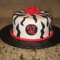 21St Birthday Cake 8 inch round covered in fondant with fondant zebra stripes. Gumpaste roses, painted with luster dust for some shimmer ~ same with "21&...
