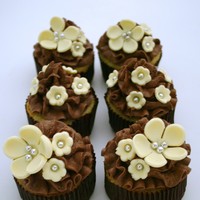 Chocolate And Yellow Gems ....these where also {with the pink flower bc cupcakes} quickly put together for my family's easter dinner.