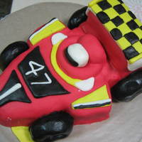 The Race My own attempt of a cake decoration from Debbie Brown. The cake is Devil's Food Cake and the icing is MMF.