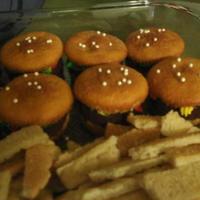 Hamburger Cupcakes! These were tons of fun to make! The buns are yellow cupcakes, the beef patties are chocolate cupcakes, the condiments are icing, and the...