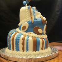 Bday Cake - Male Almost perfection until I touched the middle layer to attach the curly cues...ARGH...All in all, super cute little cake. Only 10 inches...