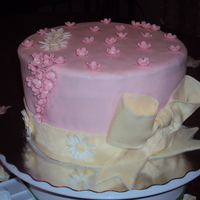 My First Fondant Cake this is my first fondant cake made for my daughters birthday. Made out of MMF with flowers made from gumpaste.